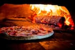 Logotipo Pizzaria Bella Dona