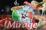 Logotipo Pizzaria Mirage