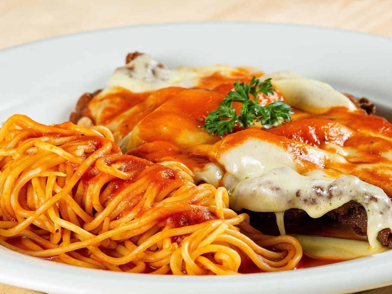 Filé á parmegiana tradicional (Serve até 3 Pessoas)